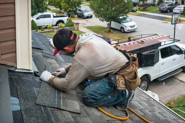 Professional Emergency Roof Repair technician working in Williston Park, NY
